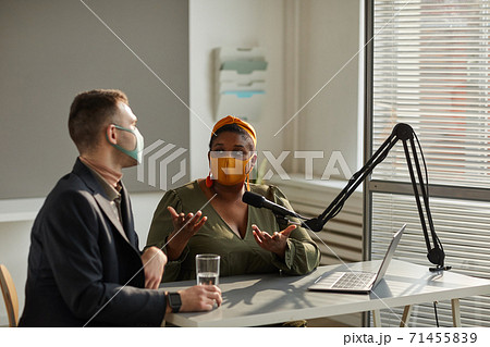 People in mask working on radio 71455839