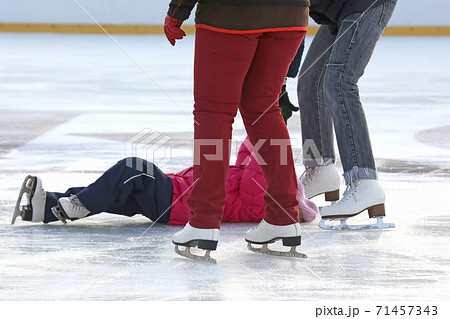 people skating on the ice rink. people skating on the ice rink. 71457343