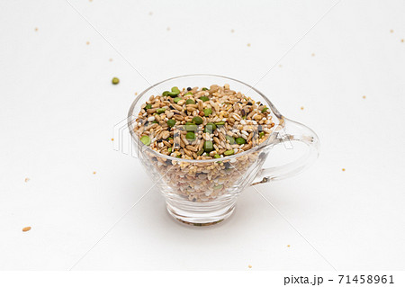 Miscellaneous grain in transparent glass cup isolated on white background  71458961