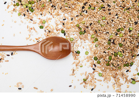 Miscellaneous grains with wood spoon Miscellaneous grains with wood spoon 71458990