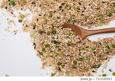 Miscellaneous grains with wood spoon Miscellaneous grains with wood spoon 71458991