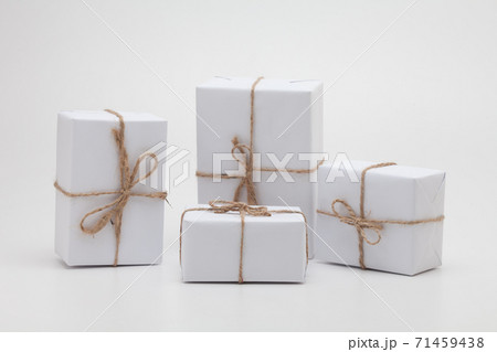 Parcels in white wrapping paper group isolated  71459438