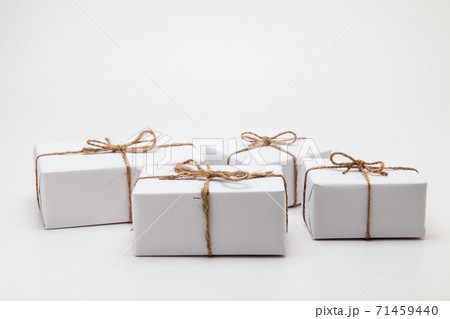 Parcels in white wrapping paper group isolated Parcels in white wrapping paper group isolated 71459440