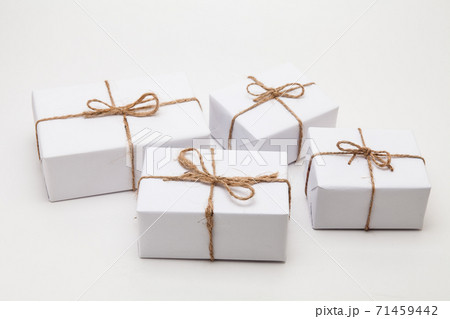 Parcels in white wrapping paper group isolated Parcels in white wrapping paper group isolated 71459442