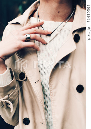 Close-up portrait Beautiful elegant woman wearing beige coat and black hat. Trendy casual outfit. Soft selective focus. grain 71459595