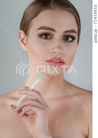 Cosmetic Treatment. Closeup Girls Hands Doing Facial Skin Lifting Injection To Woman's Face. 71459933