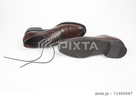 Classic men's brown shoes sole on white background 71460087