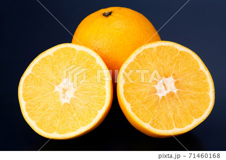 Citrus fruit sliced orange fruit on a dark background Citrus fruit sliced orange fruit on a dark background 71460168