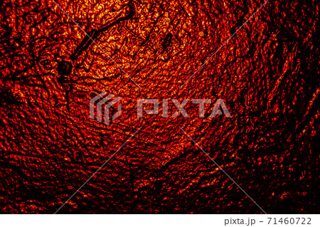 illuminated in red black texture wall as a background illuminated in red black texture wall as a background 71460722