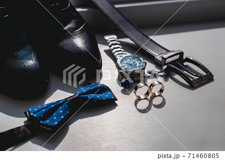 Wedding rings. Black leather shoes, watch, blue Wedding rings. Black leather shoes, watch, blue 71460805