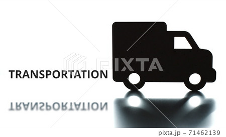 TRANSPORTATION word unloaded from the truck silhouette 71462139