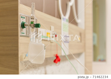 Oxygen flow-meter gauge with nozzle in medical center hospital. 71462234