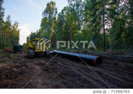 Pipelayer with side boom Installation of  gas and crude oil pipes in ground.  Pipelayer with side boom Installation of  gas and crude oil pipes in ground.  71466703