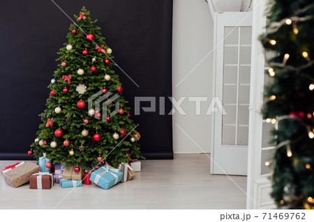 Christmas tree pine with gifts new year decor interior of the holiday postcard Christmas tree pine with gifts new year decor interior of the holiday postcard 71469762