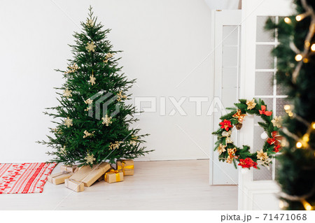 Christmas card for the new year presents the Christmas tree pine decor winter interior Christmas card for the new year presents the Christmas tree pine decor winter interior 71471068
