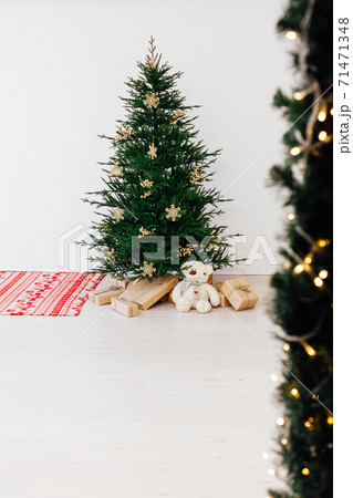 Christmas card for the new year presents the Christmas tree pine decor winter interior 71471348