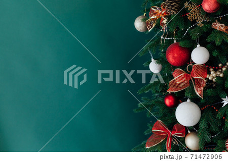 Christmas tree pine decorated with toys with gifts green background new year Christmas tree pine decorated with toys with gifts green background new year 71472906