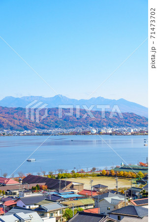 岡谷市から望む諏訪湖(遠方に八ヶ岳連峰) 岡谷市から望む諏訪湖(遠方に八ヶ岳連峰) 71473702