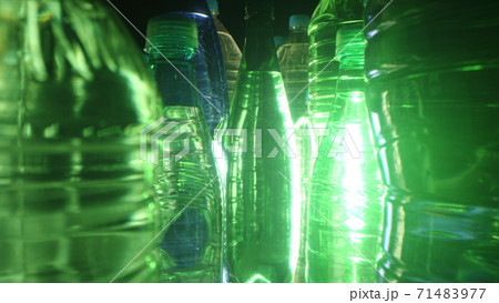 Backlit bottled water, different plastic bottles 71483977