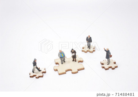 a Social Media Little people on puzzle pieces 71488481