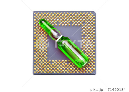 glass ampoule with green fluid for vaccination implantation cpu chip implantation for surveillance and verification human, concept on conspiracy theology theme of coronavirus top view. glass ampoule with green fluid for vaccination implantation cpu chip implantation for surveillance and verification human, concept on conspiracy theology theme of coronavirus top view. 71490184