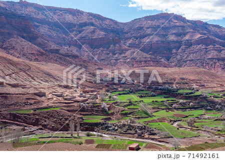 Adobe kasbah in mountain villages in the High Atlas Mountains. Morocco. Adobe kasbah in mountain villages in the High Atlas Mountains. Morocco. 71492161
