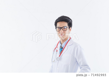 Portrait of the confident male pediatrician 71492993