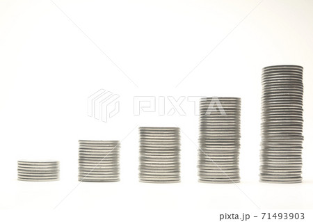 Stacks of silver coins in the form of the diagram, isolated over white background. Stacks of silver coins in the form of the diagram, isolated over white background. 71493903