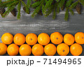 Mandarins for with fir branches Merry Christmas and Happy New Year horizontal layout 71494965