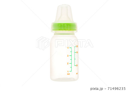 feeding bottle with pacifier and measuring scale, transparent plastic bottle with a green cap isolated on a white background. 71496235