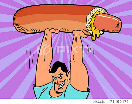 a strong athletic man lifts a huge hot dog a strong athletic man lifts a huge hot dog 71499472