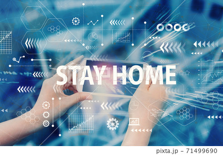 Stay home theme with person using smartphone Stay home theme with person using smartphone 71499690