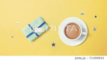 Gift box with a cup of coffee Gift box with a cup of coffee 71499691