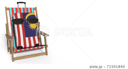 Flag of Malaysia on suitcase and beach chair. Travel concept, 3d rendering 71501840