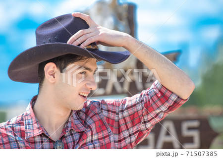 Cowboy on sign background. 71507385