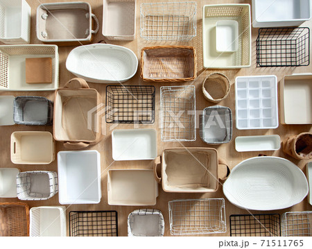 Flat lay of Marie Kondo's storage boxes, containers and baskets with different sizes and shapes 71511765