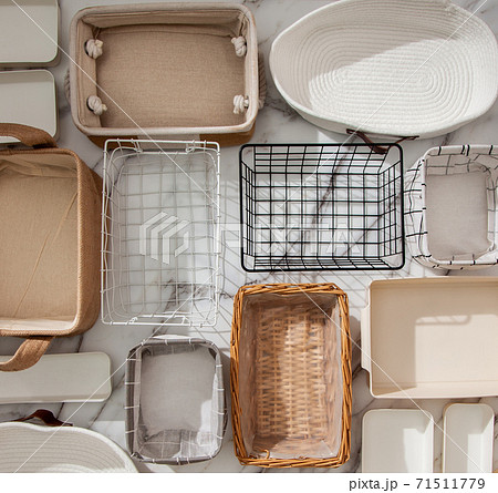 Flat lay of Marie Kondo's storage boxes, containers and baskets with different sizes and shapes 71511779