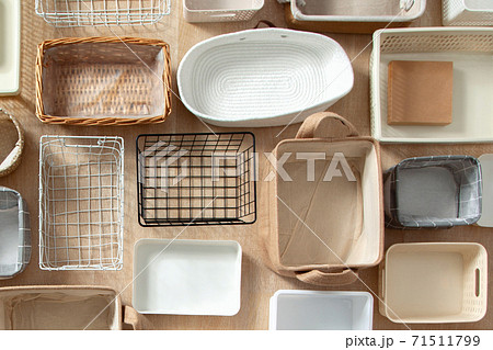 Flat lay of Marie Kondo's storage boxes, containers and baskets with different sizes and shapes 71511799