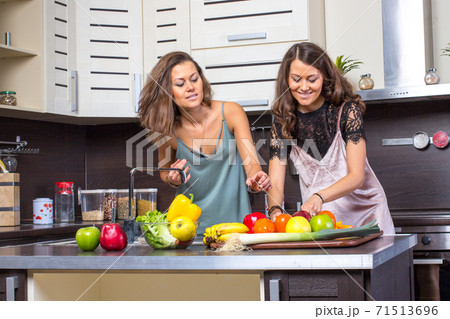 Twins on kitchen in the morning 71513696