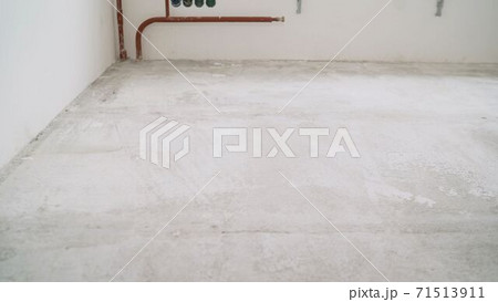 Floors before treatment. Concrete floors in a new apartment. over view,repair cracked floor before waterproof cement treatment system. Floors before treatment. Concrete floors in a new apartment. over view,repair cracked floor before waterproof cement treatment system. 71513911