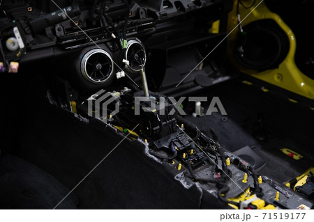 Car factory. Car without interior elements. Car under montage. Car factory. Car without interior elements. Car under montage. 71519177