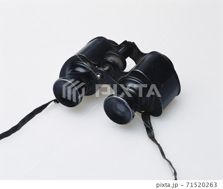 old vintage binoculars isolated on white 71520263