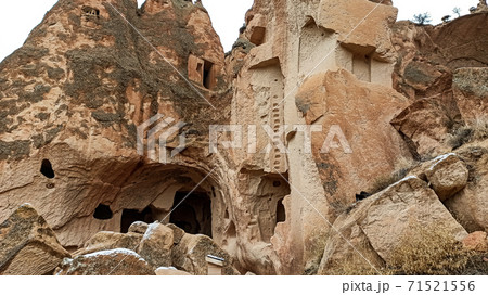 Cave houses and monasteries carved into Tufa Rocks at Zelve Open Air Museum (Zelve Valley) in winter season in Cappadocia, Turkey 71521556