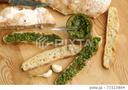 pesto sauce, sliced roasted italian ciabatta bread for cooking bruschetta sandwiches 71523804