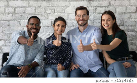 Four multiethnic persons job seekers showing thumbs up being hired Four multiethnic persons job seekers showing thumbs up being hired 71524237