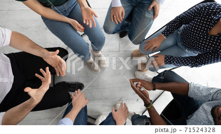 Diverse people group sitting in circle on mental therapy session 71524328