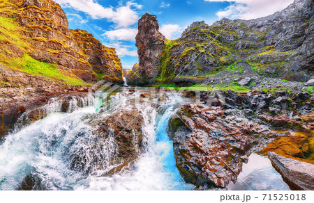 Marvelous view of Kolugljufur canyon and Kolufossar falls. Marvelous view of Kolugljufur canyon and Kolufossar falls. 71525018