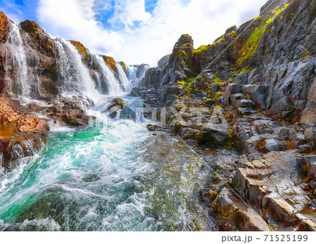 Charming view of  Kolufossar waterfall at summer sunny day. 71525199