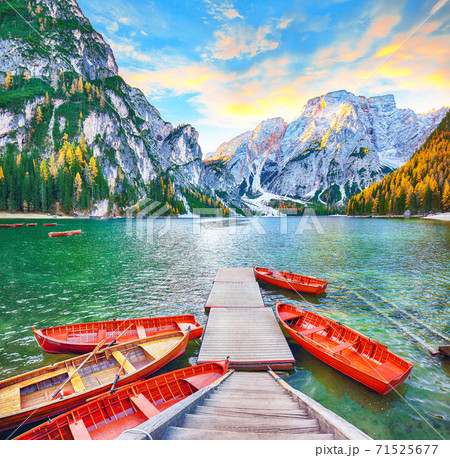 Amazing scenery of famous alpine lake Braies at autumn Amazing scenery of famous alpine lake Braies at autumn 71525677