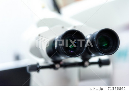 Microscope in the dental office 71526862